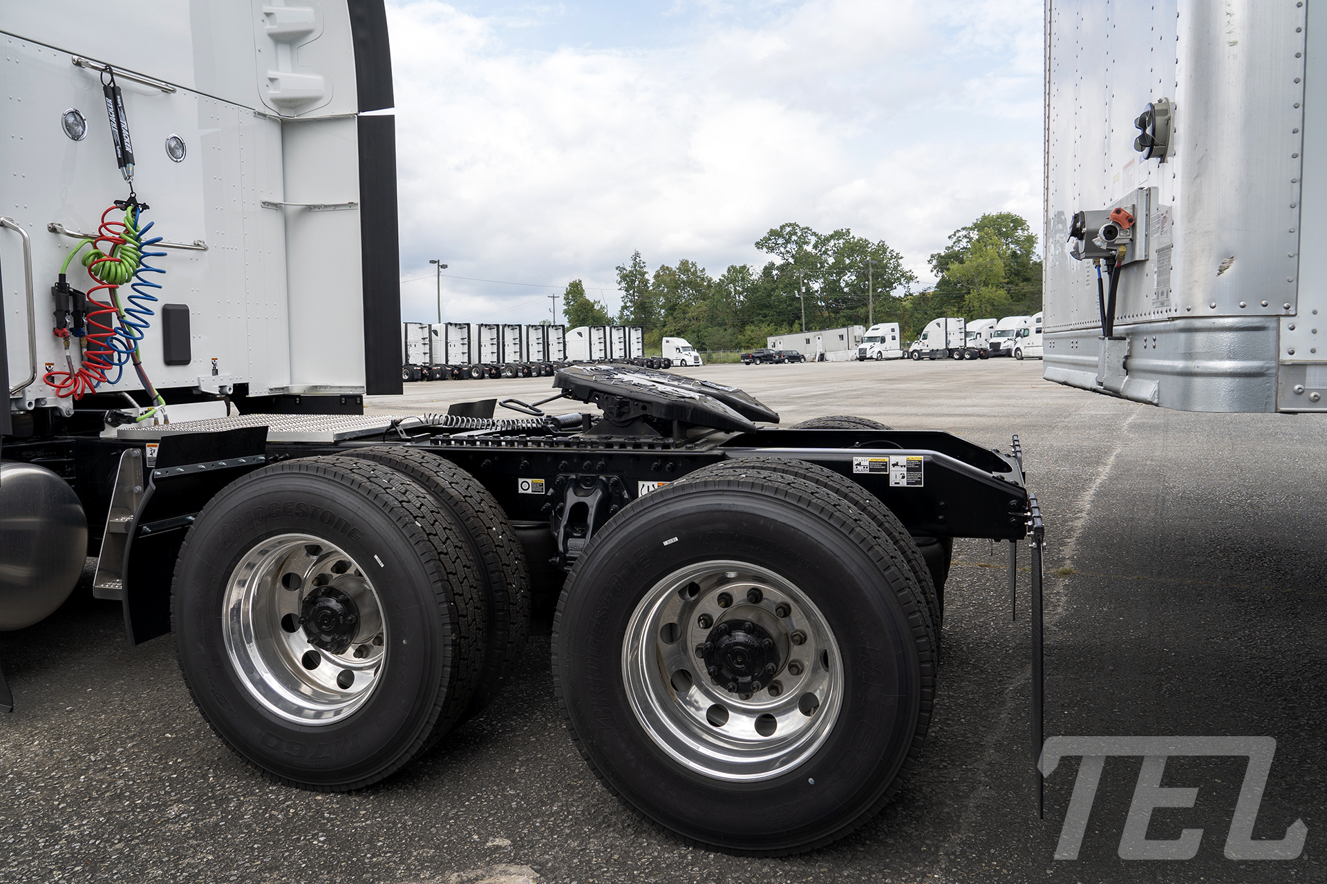 The rear of a TEL tractor with the 5th wheel plate tilted.